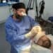 Dr Elgindi performing Ronnie Vint's hair transplant
